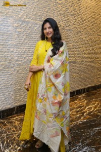 Singer Mangli in a yellow salwar dress