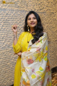 Singer Mangli in a yellow salwar dress