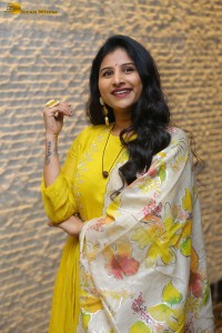 Singer Mangli in a yellow salwar dress