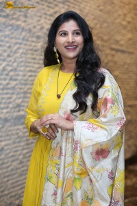 Singer Mangli in a yellow salwar dress