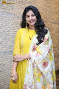 Singer Mangli in a yellow salwar dress