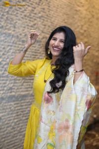 Singer Mangli in a yellow salwar dress