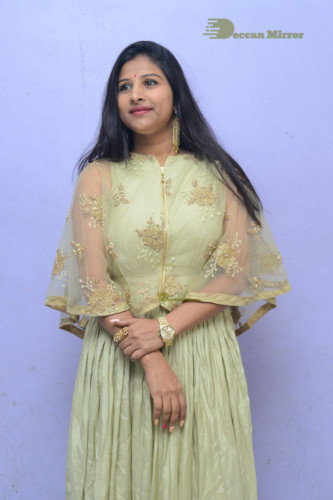 Telugu singer anchor actress Mangli photoshoot in a green dress
