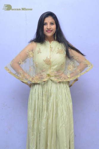 Telugu singer anchor actress Mangli photoshoot in a green dress