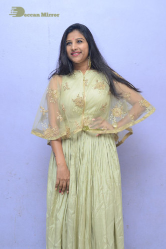 Telugu singer anchor actress Mangli photoshoot in a green dress