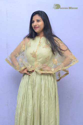 Telugu singer anchor actress Mangli photoshoot in a green dress