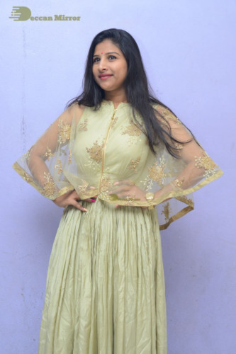 Telugu singer anchor actress Mangli photoshoot in a green dress