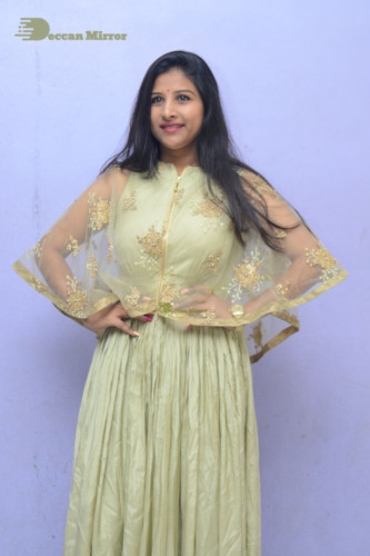 Telugu singer anchor actress Mangli photoshoot in a green dress