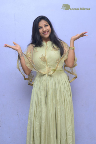 Telugu singer anchor actress Mangli photoshoot in a green dress