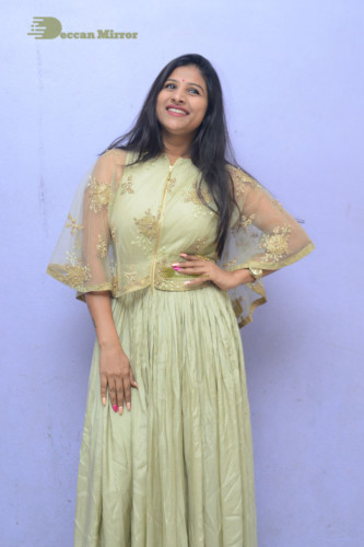 Telugu singer anchor actress Mangli photoshoot in a green dress