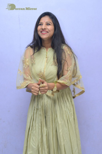 Telugu singer anchor actress Mangli photoshoot in a green dress