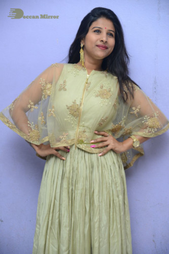Telugu singer anchor actress Mangli photoshoot in a green dress