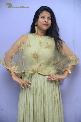 Telugu singer anchor actress Mangli photoshoot in a green dress