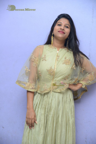 Telugu singer anchor actress Mangli photoshoot in a green dress