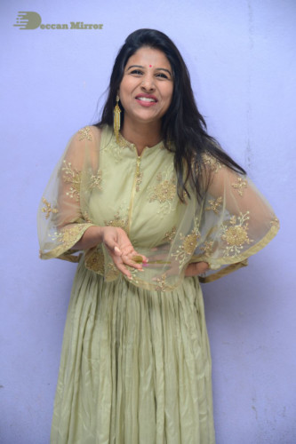 Telugu singer anchor actress Mangli photoshoot in a green dress