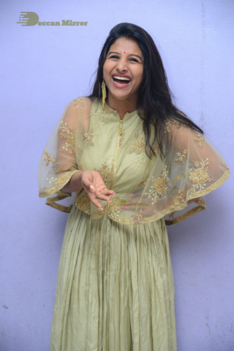 Telugu singer anchor actress Mangli photoshoot in a green dress