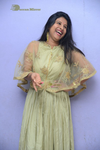 Telugu singer anchor actress Mangli photoshoot in a green dress