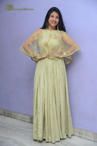 Telugu singer anchor actress Mangli photoshoot in a green dress