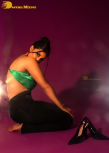 Actress Mannara Chopra in a pink skirt and suit