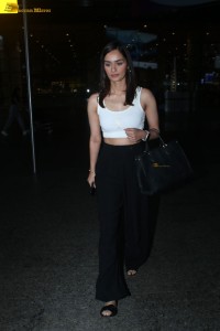 miss world and actress manushi chhillar glam look in a white tanktop at airport