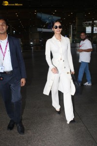 beauty queen and actress Manushi Chhillar dressed in all white at mumbai airport
