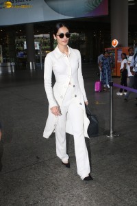 beauty queen and actress Manushi Chhillar dressed in all white at mumbai airport