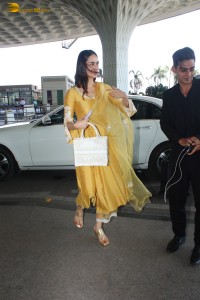 actress and former miss world manushi chhillar looking gorgeous in a yellow salwar