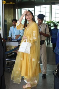 actress and former miss world manushi chhillar looking gorgeous in a yellow salwar