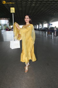 actress and former miss world manushi chhillar looking gorgeous in a yellow salwar