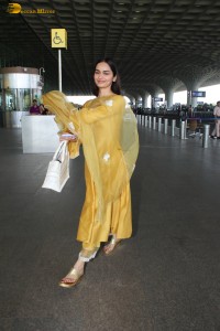 actress and former miss world manushi chhillar looking gorgeous in a yellow salwar