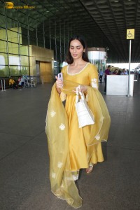 actress and former miss world manushi chhillar looking gorgeous in a yellow salwar