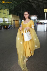 actress and former miss world manushi chhillar looking gorgeous in a yellow salwar