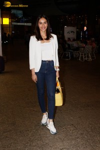 miss world and actress manushi chhillar stylish looks in white shirt and denim jeans