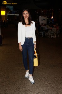 miss world and actress manushi chhillar stylish looks in white shirt and denim jeans