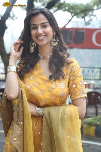 Indian actress meenakshi chaudhary in a yellow dress