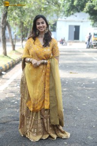 Indian actress meenakshi chaudhary in a yellow dress