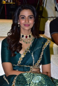 Meenakshi Chaudhary gorgeous in a green saree at a movie function