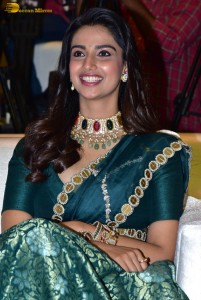 Meenakshi Chaudhary gorgeous in a green saree at a movie function