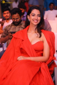 actress Meenakshi Chaudhary red hot looks in a red dress at SIIMA event