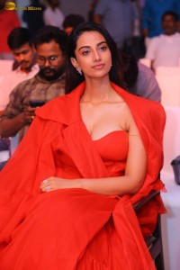 actress Meenakshi Chaudhary red hot looks in a red dress at SIIMA event