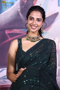 actress Meenakshi Chaudhary gorgeous in a green saree attending an event