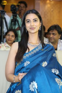 actress Meenakshi Chaudhary dazzles in a blue saree at a function