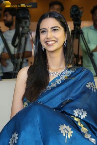 actress Meenakshi Chaudhary dazzles in a blue saree at a function