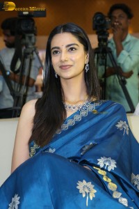 actress Meenakshi Chaudhary dazzles in a blue saree at a function