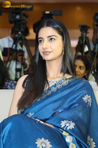 actress Meenakshi Chaudhary dazzles in a blue saree at a function