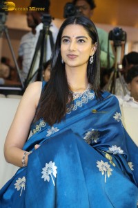 actress Meenakshi Chaudhary dazzles in a blue saree at a function