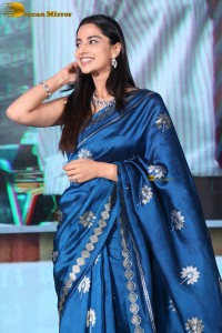 actress Meenakshi Chaudhary dazzles in a blue saree at a function