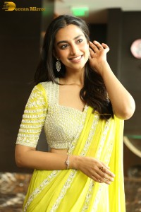 actress Meenakshi Chaudhary beautiful in a yellow saree