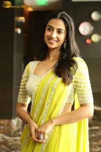 actress Meenakshi Chaudhary beautiful in a yellow saree