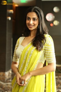 actress Meenakshi Chaudhary beautiful in a yellow saree